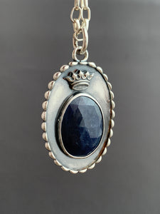 Blue sapphire and Our Lady of Guadalupe pendant