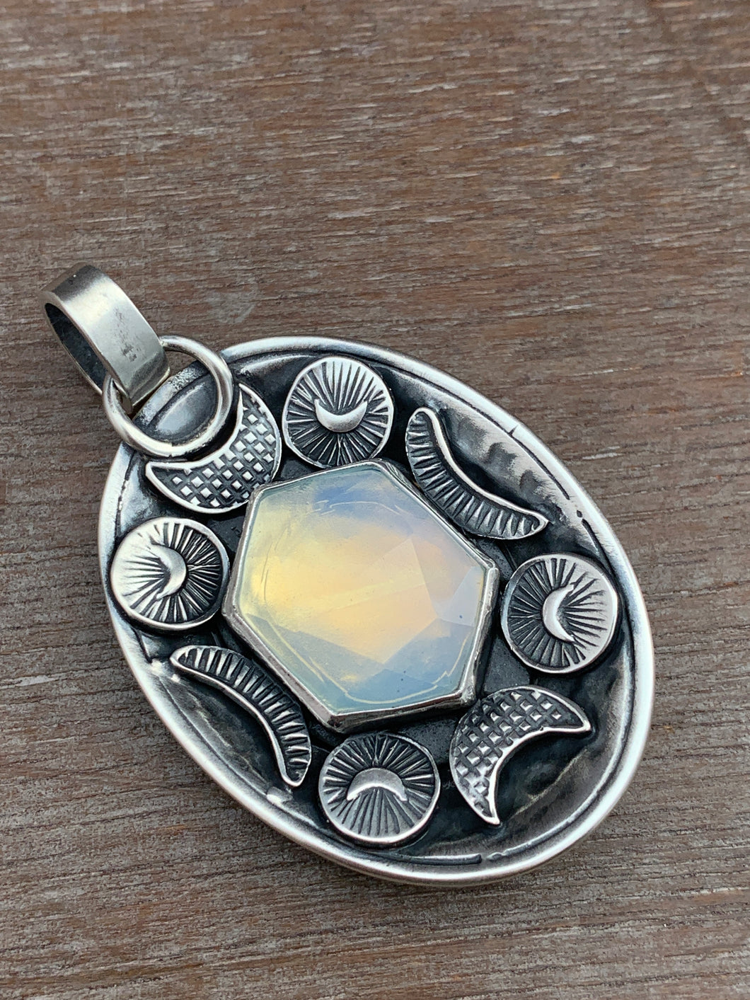 Opalite double sided dragon egg medallion