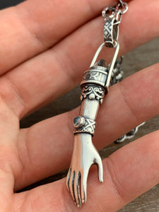 Hand pendant with eye on the palm