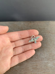 Small labradorite stamped bird pendant