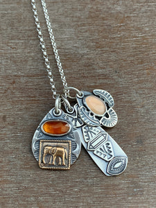 Elephant garnet and peach moonstone charm set.