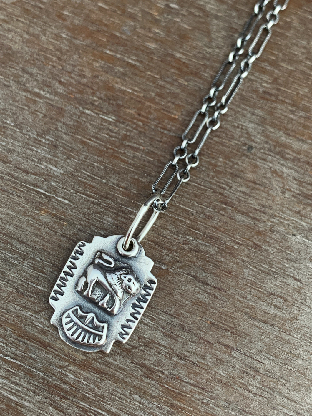 Lion charm necklace