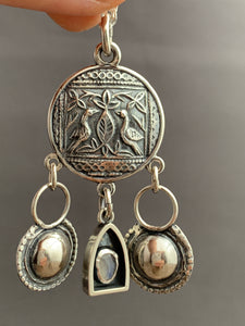 Bird medallion with handmade bells and a tiny moonstone shrine