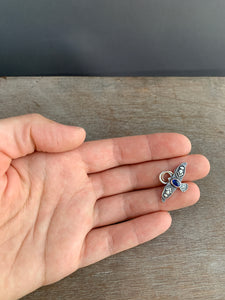 Small kyanite stamped bird pendant