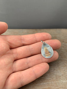Silver and gold triangle charm