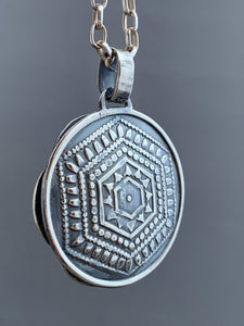 Leland blue double sided medallion