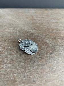 Sterling silver open eye heart pendant