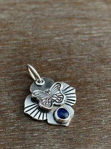 Butterfly and kyanite charm