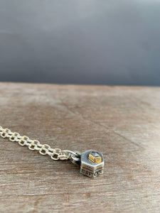 Tiny hexagon diamond pendant