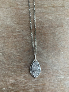 Sacred heart silver charm