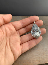 Load image into Gallery viewer, Sterling silver bear with antlers and a feather pendant
