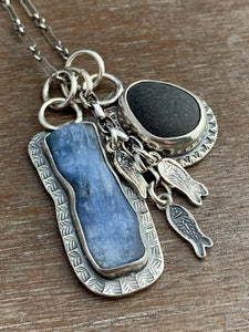 Lake Erie beach stone charm necklace, with a blue kyanite, and tiny fish charms