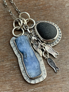 Lake Erie beach stone charm necklace, with a blue kyanite, and tiny fish charms