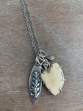 Load image into Gallery viewer, Fossilized walrus ivory charm set
