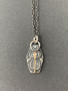 Sterling silver and 18k gold pendant