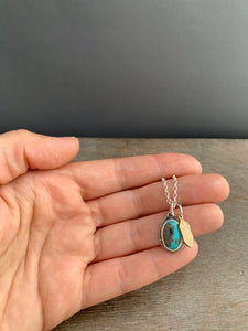 Small Turquoise charm with a 14k gold filled feather