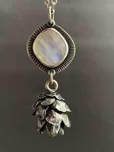 Cast cedar cone necklace with a moonstone