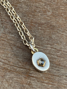 Tiny diamond pendant