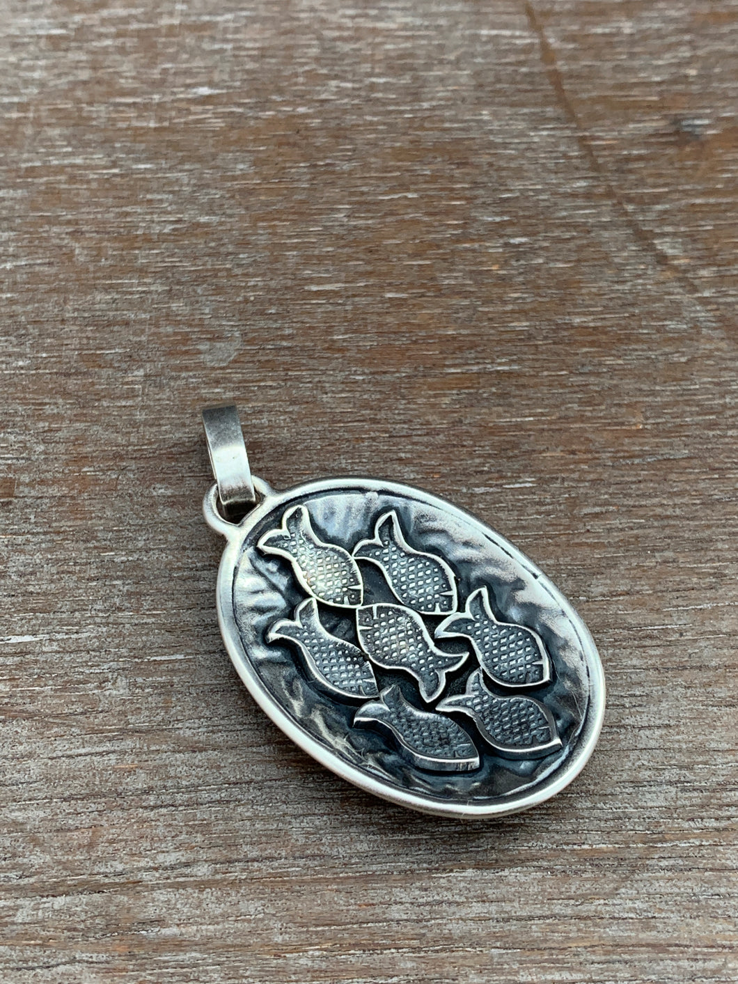 Silver fish parable pendant