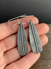 Load image into Gallery viewer, Medium/small Stamped silver feather earrings

