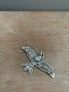 Large moonstone stamped bird pendant