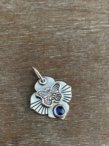 Butterfly and kyanite charm